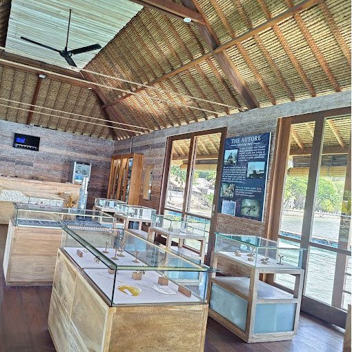 A showroom at the pearl farm, featuring exquisite pearls displayed in elegant settings, inviting visitors to marvel at the natural beauty and craftsmanship of these treasures from the sea